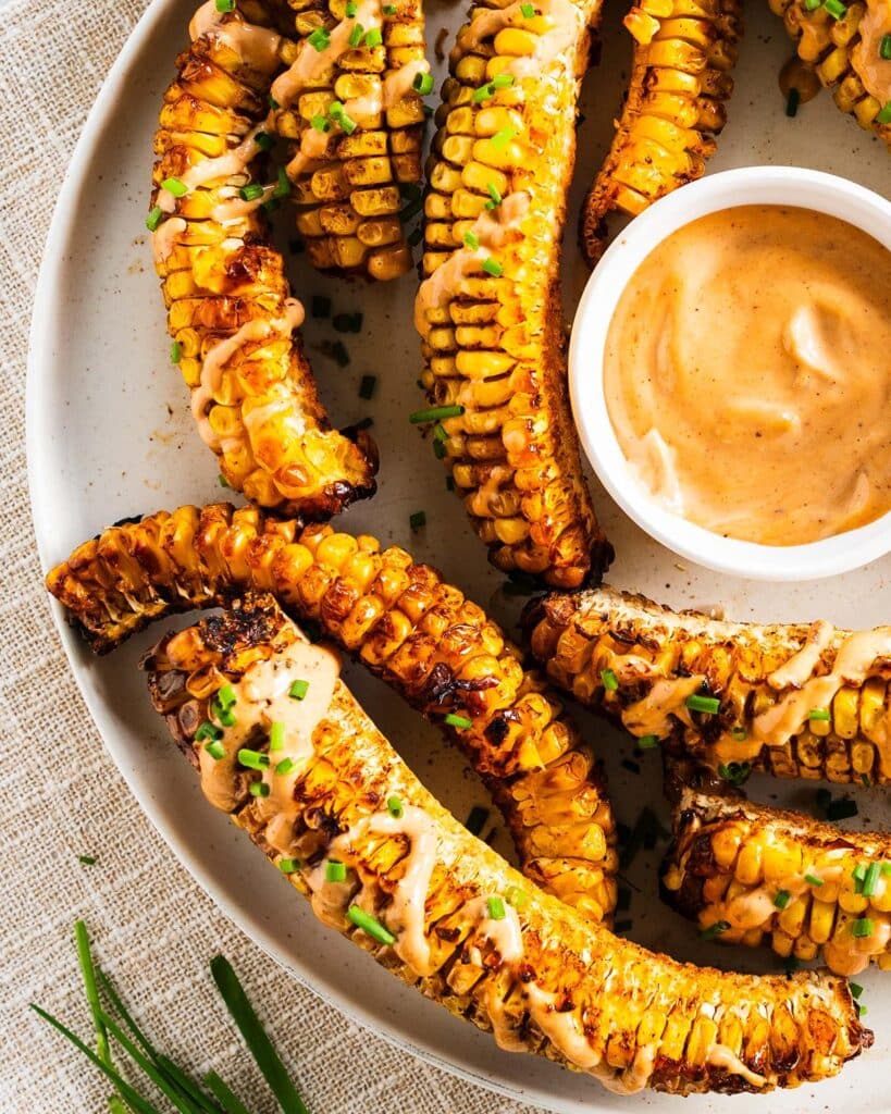 Air fryer corn ribs are THE food to go nuts for! Packed with so much delicious flavour, they are also a fun side or appetiser to feed a crowd too! Recipe by Jaz Kitchen
