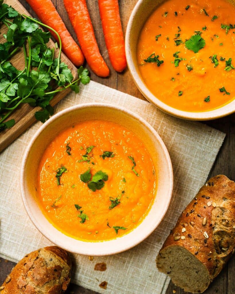 A bowl of Carrot and Coriander Soup with a sprinkle of coriander over the top. Image by Jaz Kitchen