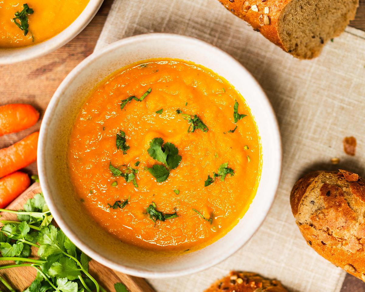 A bowl of Carrot and Coriander Soup with a sprinkle of coriander over the top. Image by Jaz Kitchen