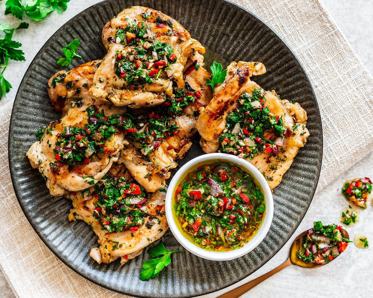 Our chimichurri with chicken is bright, vibrant and fresh, with tender chicken thighs and a beautiful sauce you will not be able to get enough of! Recipe by Jaz Kitchen