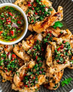 Our chimichurri with chicken is bright, vibrant and fresh, with tender chicken thighs and a beautiful sauce you will not be able to get enough of! Recipe by Jaz Kitchen