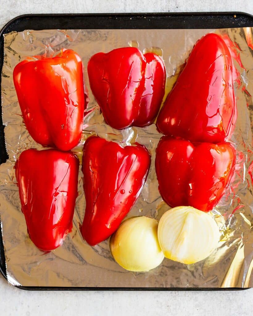 red peppers and onions drizzled in olive oil. Image by Jaz Kitchen