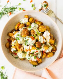 This crispy potato salad has it all: a light crunchy texture, cooling vibrant dressing and it looks so good to boot! Always a popular dish at any dinner table! Recipe by jaz kitchen