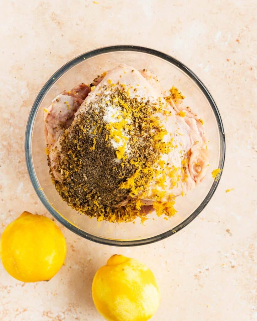 Mix the chicken with the oregano, lemon zest, salt and pepper...