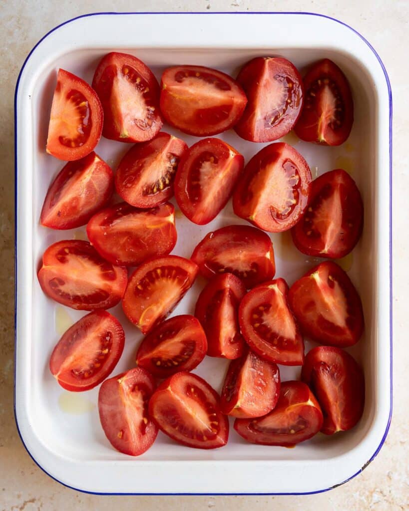 Quartered tomatoes pre baking. Image by Jaz Kitchen