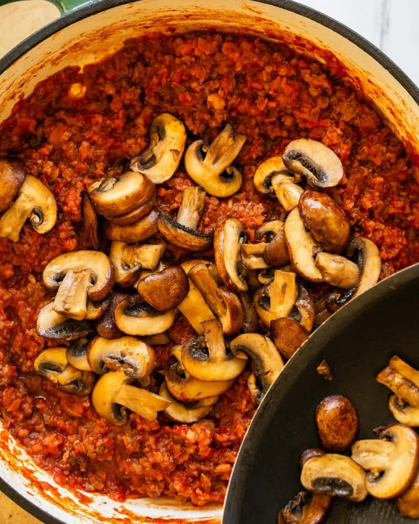 add the mushrooms to the ragu. Image by Jaz Kitchen