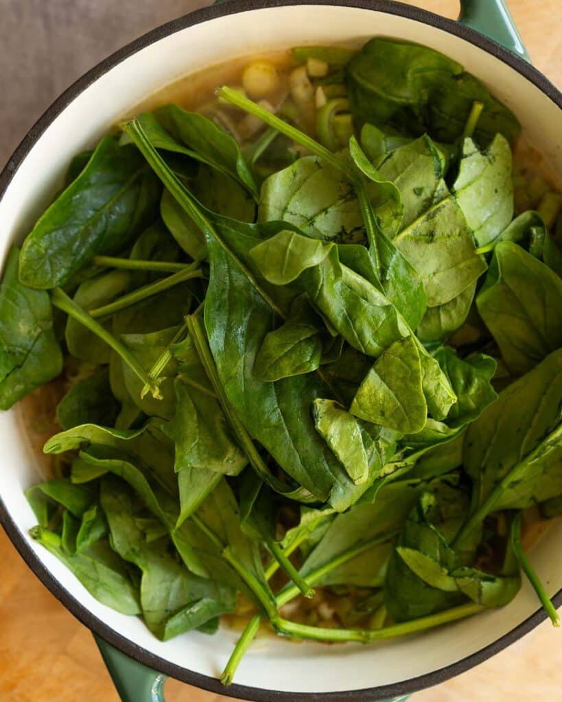 Before tipping in the spinach and cooking until wilted. Recipe by jaz kitchen