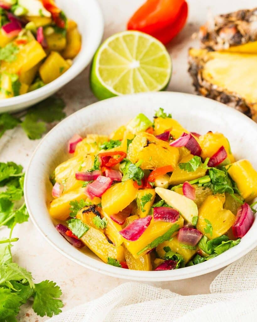 Image of two plates of pineapple habanero salsa.